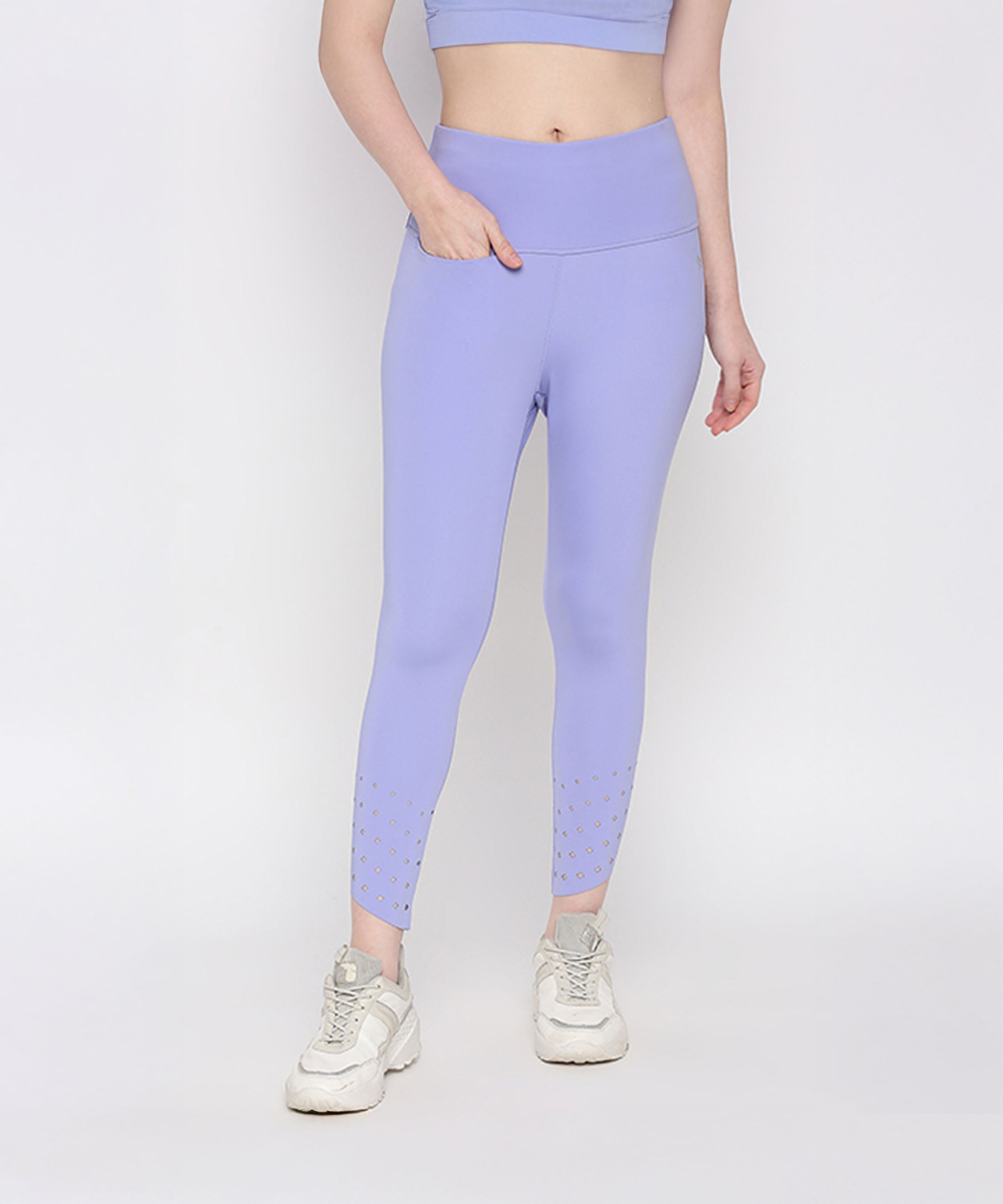 Woman wearing the Tuna Active Lavender Co-ord Set with white sneakers, standing against a plain background—ideal for those seeking stylish women’s activewear.