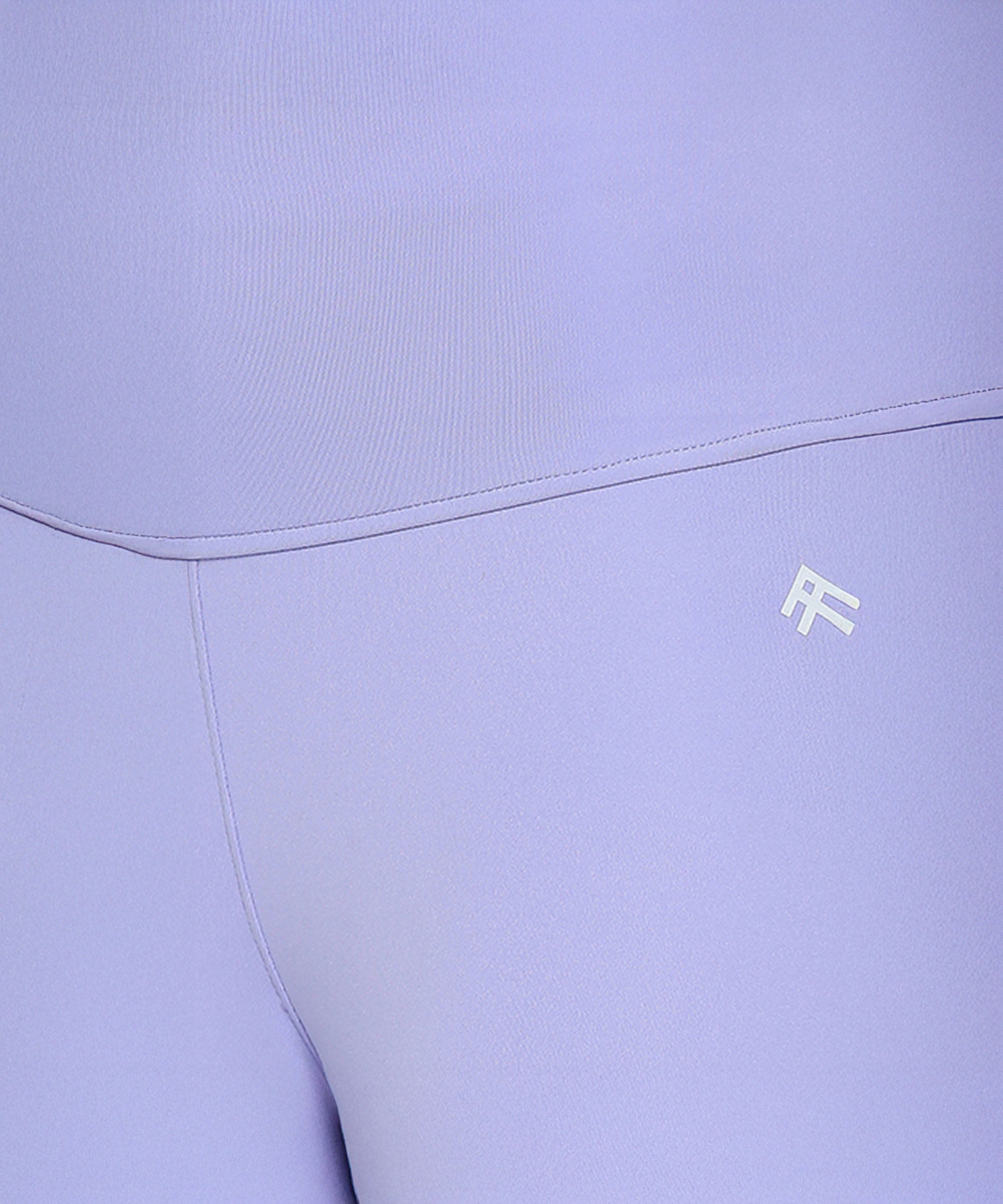 Close-up of the Tuna Active Lavender Co-ord Set, a women's activewear staple, showcasing lavender leggings with a small white logo near the hip.
