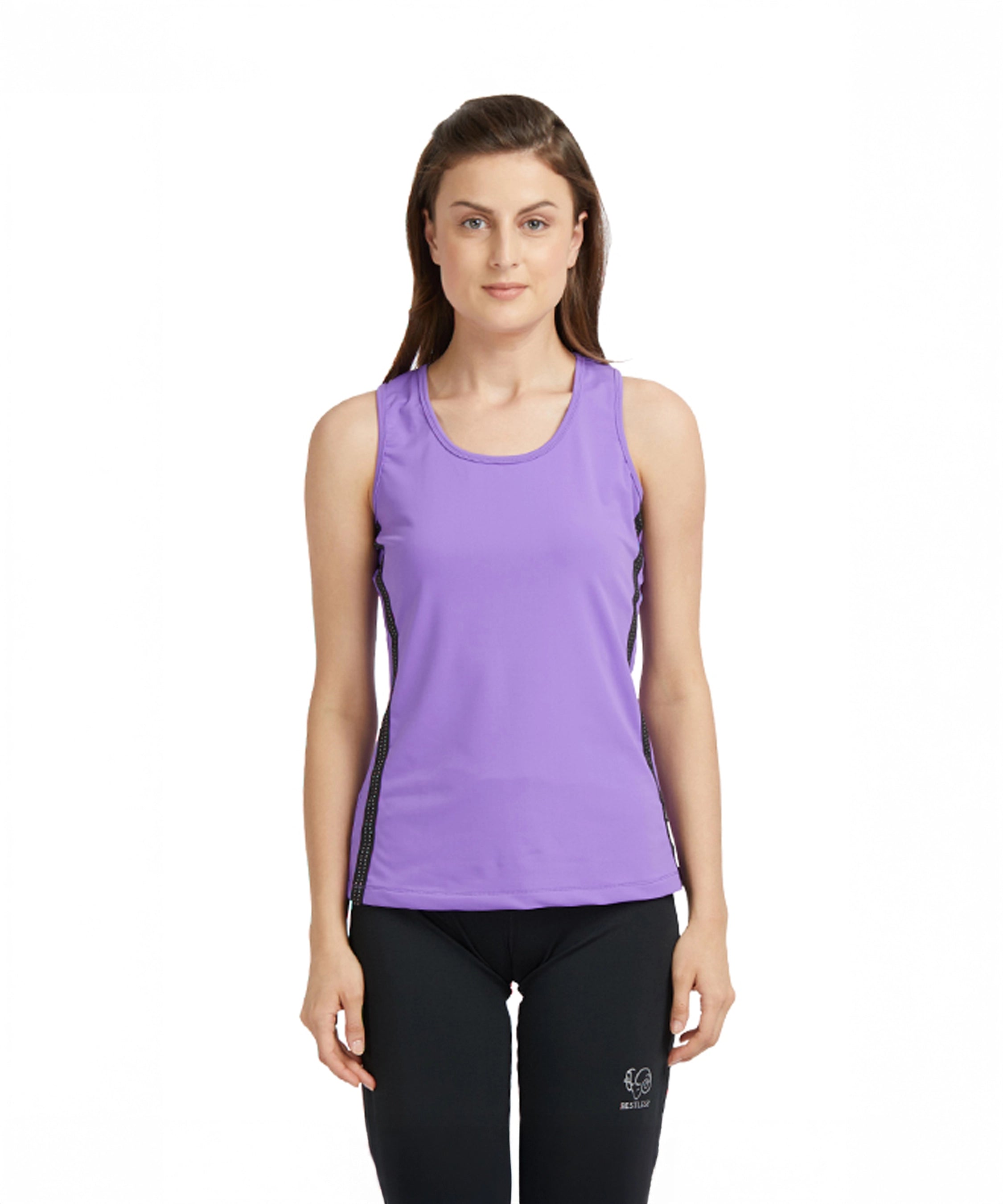 Woman wears a purple round neck sleeveless top and black leggings against a white background, highlighting the moisture-wicking design that's perfect for active workouts.