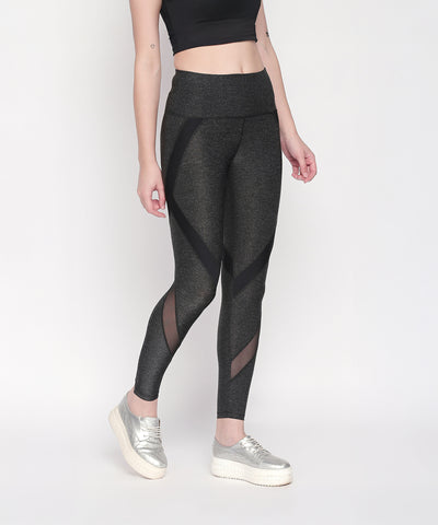 Woman wearing Grey High Waisted Sports Leggings LG14, a black crop top, and silver platform sneakers.