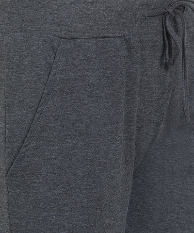 Close-up of Joggers - Ashtanga Series Grey by TUNA LONDON for women, featuring a dark gray color, drawstring waist, and visible front pocket.