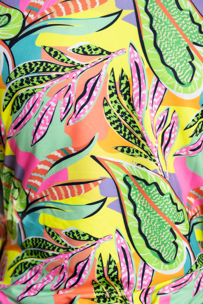 Close-up of Neon colour Printed Jacket made with skin-friendly polyblended fabric, showcasing vibrant tropical leaf patterns in green, pink, orange, and yellow tones.