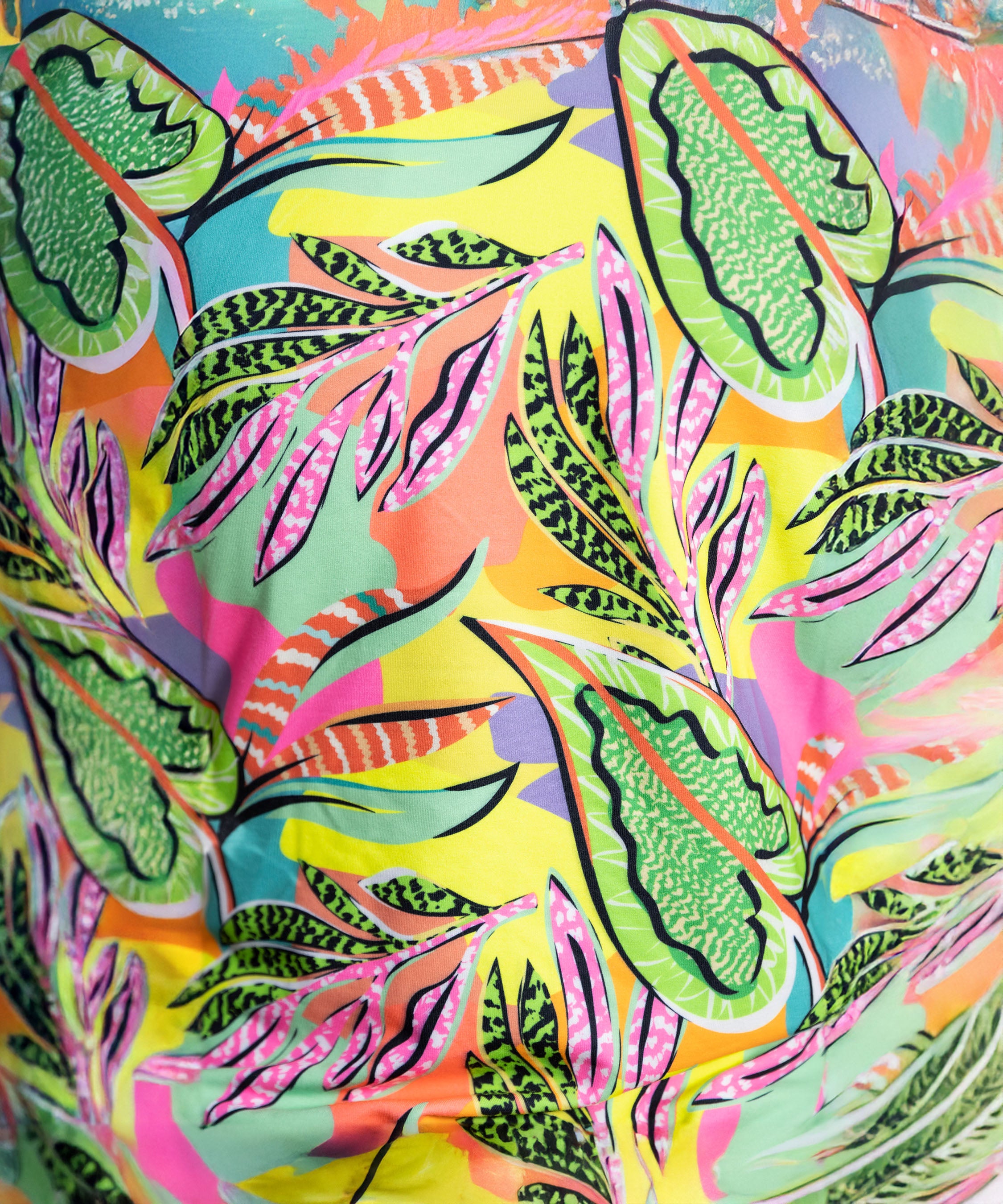 The Neon Colour Printed Jacket features skin-friendly polyblended fabric with bold tropical leaf patterns in green, pink, orange, yellow, and blue—perfect for a standout look.
