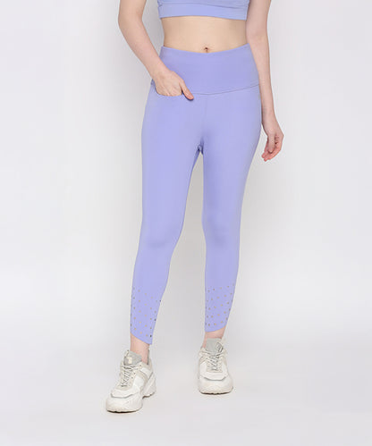 Woman wearing the Tuna Active Lavender Co-ord Set with white sneakers, standing against a plain background—ideal for those seeking stylish women’s activewear.