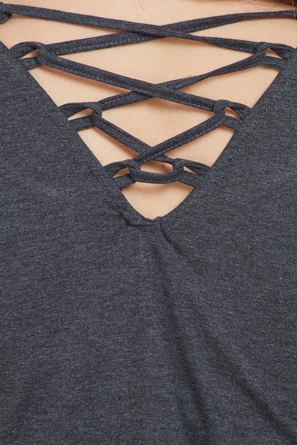 Close-up of a Grey Round Neck Tee by TUNA LONDON, designed in dark grey with moisture-wicking fabric for all-day comfort.
