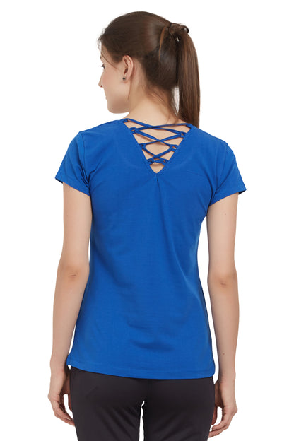 Woman in a Royal Blue Round Neck Tee by TUNA LONDON, featuring crisscross back lacing; crafted from moisture-wicking fabric for comfort, shown facing away from the camera.