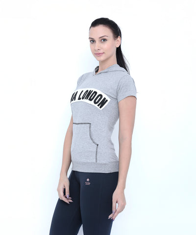 Fitness women will love this Grey Hoodie featuring "LTA LONDON" text, paired with black pants—a sporty yet casual look perfect for any occasion.