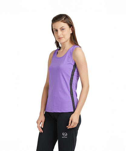 A woman wears a Purple round neck sleeveless top with moisture-wicking fabric and black pants, standing against a plain white background.