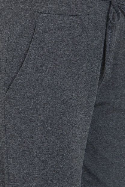 Close-up of Classic Joggers 81 in dark gray, featuring a pocket and an adjustable drawstring—ideal for comfortable loungewear.