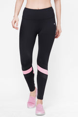 Black High Waisted Compression Legging With a Neon Pink Patch