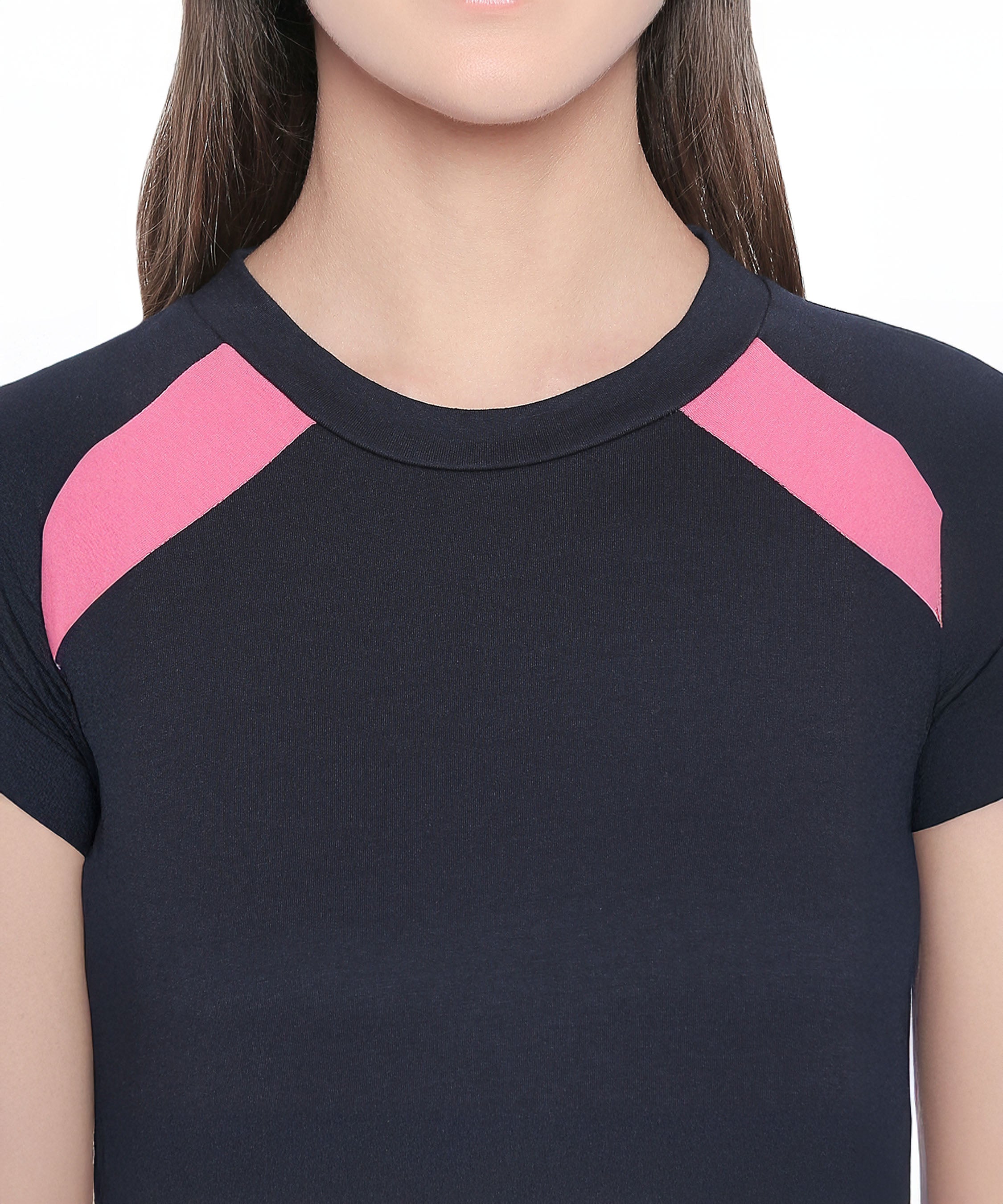 The Sportswear Navy Blue Tracksuit features a short-sleeve top with pink shoulder accents, ideal for workouts or lounging at home. Shown from shoulders to chest.
