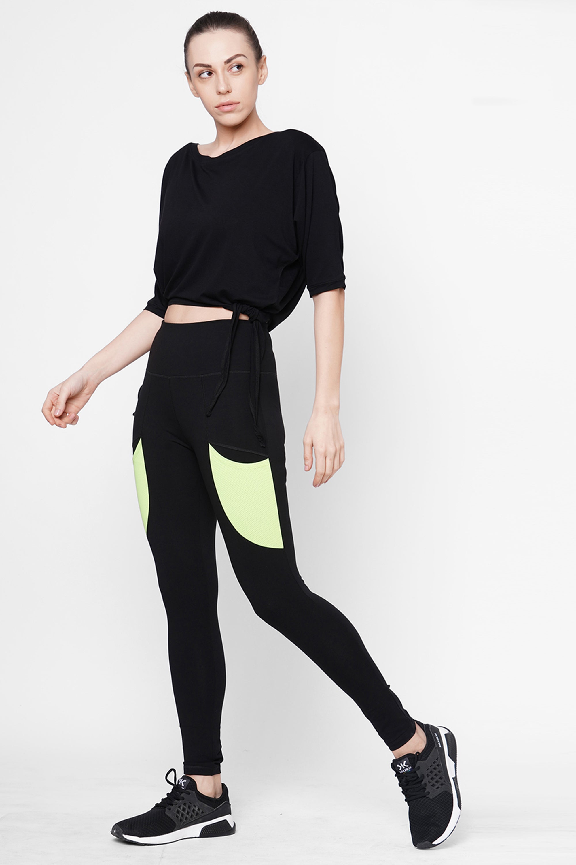 Black Leggings With Neon Green Patch
