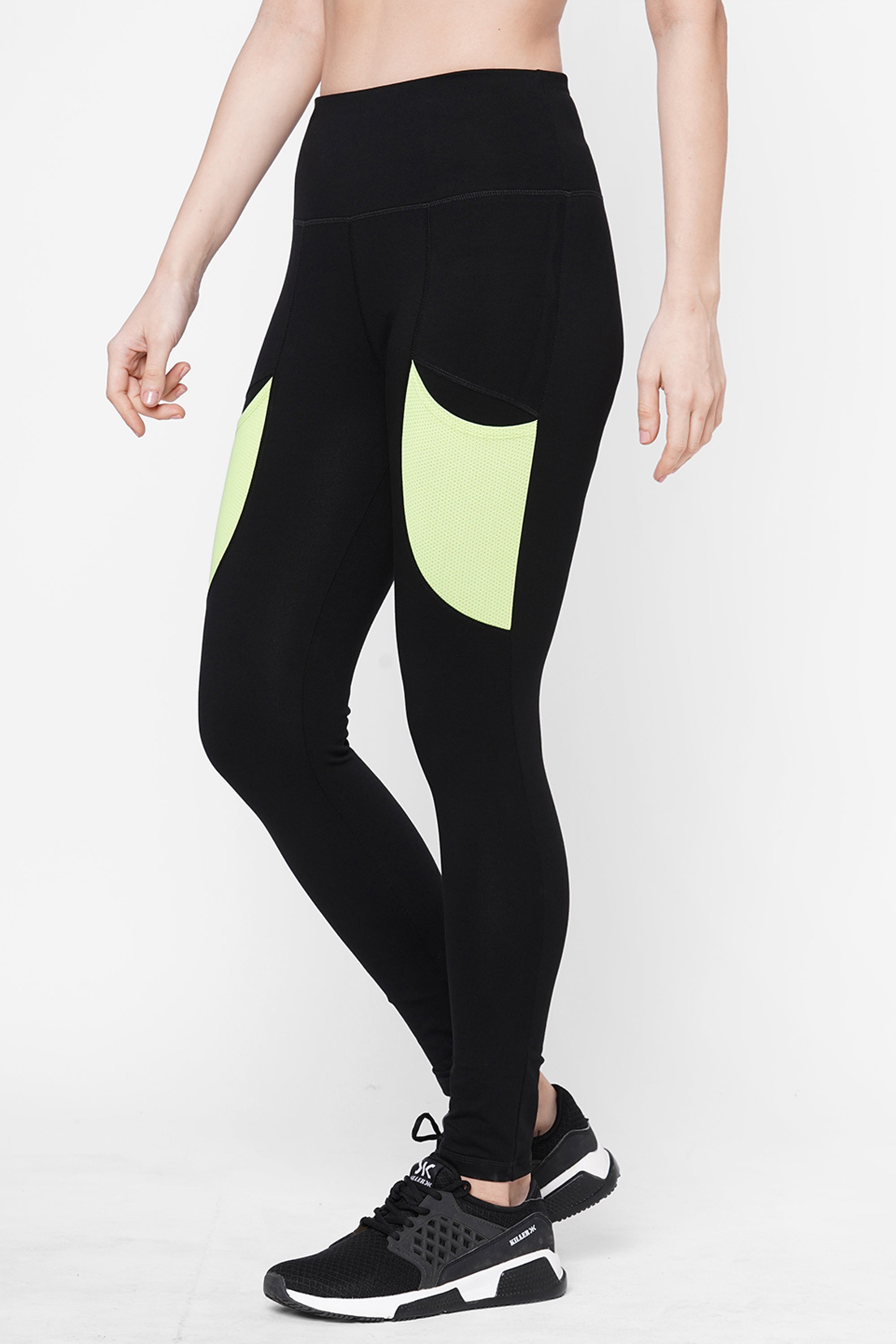 Black Leggings With Neon Green Patch
