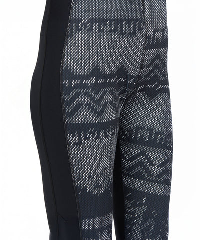 Close-up of black Printed Capri leggings featuring a gray and white geometric knit pattern on the front, perfect as stylish workout pants.