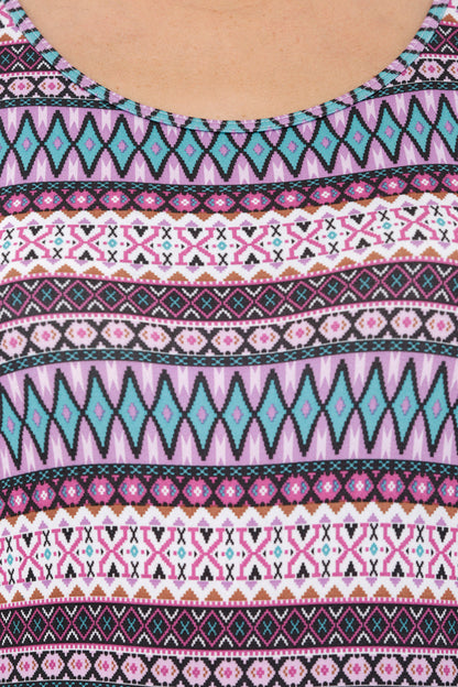 Close-up of the Multi-Print Sleeveless Tee With Built-In Bra Cups BT70, featuring vibrant geometric patterns in pink, teal, black, and white—ideal for intense workouts.