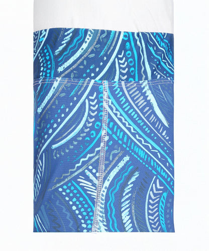 Close-up of Tuna Active Printed Blue Leggings featuring abstract blue and white wavy and dotted patterns.